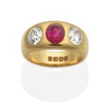 An 18 Carat Gold Ruby and Diamond Three Stone Ring, a high domed oval cabochon ruby between old