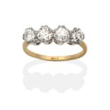 A Diamond Four Stone Ring, four old cut diamonds in claw settings, to knife edge shoulders, total