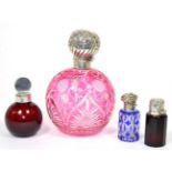 A Silver Mounted Cranberry Overlay Glass Scent Bottle, W I Broadway, Birmingham 1900, of ovoid form,