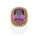 An 18 Carat Gold Amethyst, Diamond and Pearl Cluster Ring, a cushion cut amethyst in a closed back