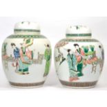 A Matched Pair of Chinese Porcelain Ovoid Jars and Covers, 19th century, painted in famille verte