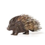 A Cold Painted Bronze Figure of a Porcupine, Franz Bergmann, Austria, standing on all fours and