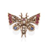 A Victorian Diamond and Multi-Gemstone Butterfly Brooch, with ruby set eyes, pearl set body and