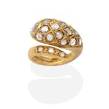 An 18 Carat Gold Diamond Snake Ring, inset with rose cut diamonds to a snake motif crossover