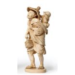 A Japanese Ivory Okimono, Meiji period, as a man carrying a cricket cage, a boy reaching for a