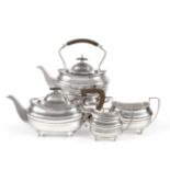 A George V Silver Four Piece Tea Service, Walker & Hall, Sheffield 1920, comprising: kettle on stand