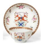 A Chinese Armorial Porcelain Tea Bowl and Saucer, en suite with the previous lot See illustration