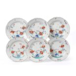 A Set of Six Meissen Porcelain Plates, circa 1740, painted in Kakiemon style with flowers within