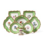 A Flight Barr & Barr Worcester Porcelain Dessert Service, circa 1830, painted with named botanical