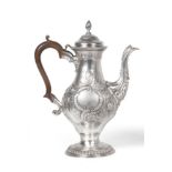 A George III Silver Coffee Pot, William Grundy, London 1772, pear shaped on circular domed foot,