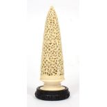 An Indian Ivory Finial, 19th century, of conical form carved and pierced with scrolling foliage