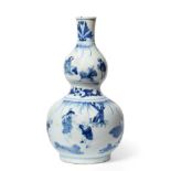 A Chinese Porcelain Double Gourd Vase, Transitional period, mid 17th century, painted in