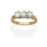 An 18 Carat Gold Diamond Three Stone Ring, round brilliant cut diamonds in claw settings, to