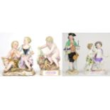 A Meissen Porcelain Figure Group, circa 1900, possibly representing Africa, as a boy wearing a