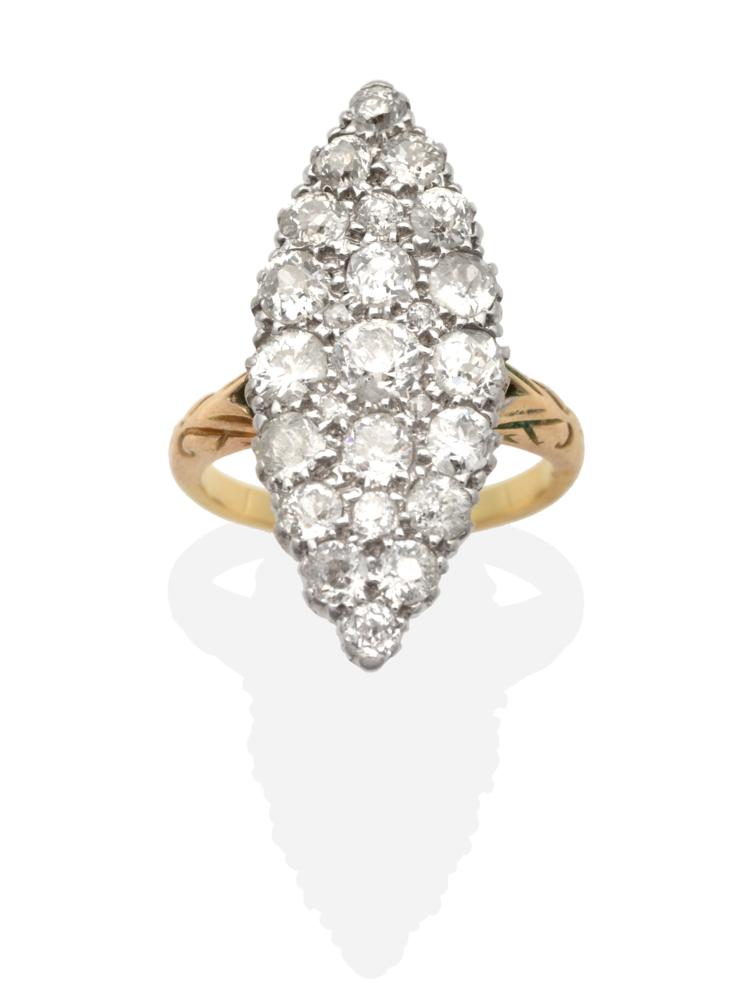 A Diamond Navette Ring, set throughout with old cut diamonds, to scroll shoulders, total estimated