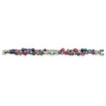 A Multi-Gemstone and Diamond Bracelet, of carved and cabochon emeralds, sapphires and rubies to pavé