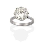 An 18 Carat White Gold Solitaire Diamond Ring, a round brilliant cut diamond in a claw setting, to