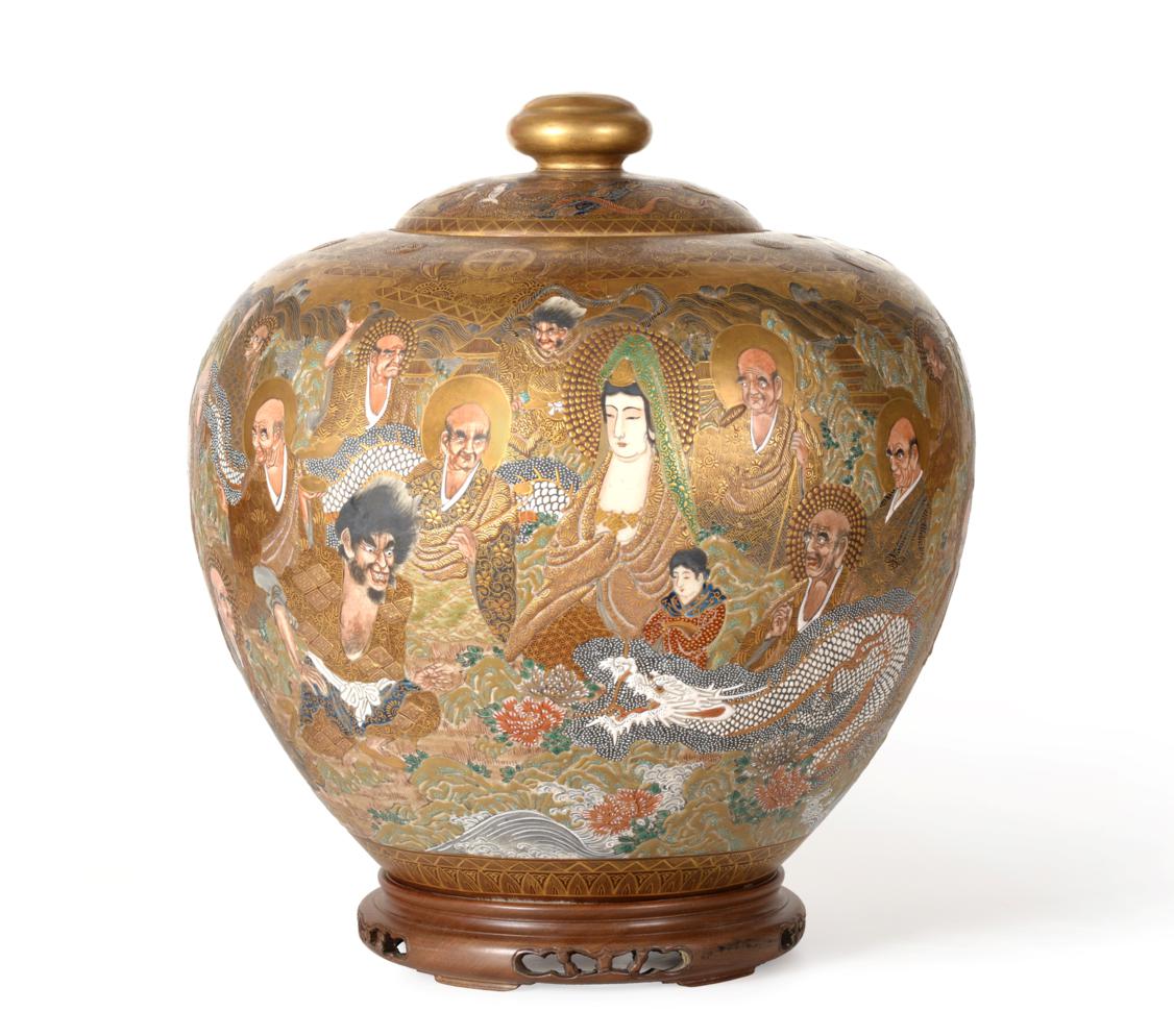 A Satsuma Earthenware Ovoid Jar and Cover, Meiji period, typically painted with immortals below a