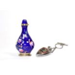 A Viennese Enamel Pear Shaped Scent Bottle, painted with flowers on a blue ground, 8.5cm high; and