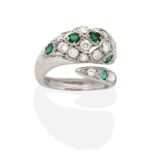 An 18 Carat White Gold Emerald and Diamond Snake Ring, inset with round brilliant cut diamonds, a