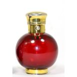 A Late Victorian Gilt White Metal Ruby Glass Scent Bottle, of ovoid form with hinged cover and