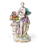 A Chelsea Porcelain Figure of Flora, circa 1755, from a set of The Seasons, the standing goddess