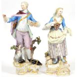 A Pair of Meissen Porcelain Figures of a Shepherd and Shepherdess, late 19th century, he bolding a