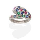 An 18 Carat White Gold Multi-Gemstone Snake Ring, inset with round cut emeralds, sapphires,