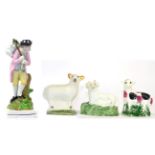 A Staffordshire Pearlware Figure of a Lost Sheep, circa 1820, the standing shepherd holding a ewe
