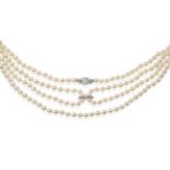 A Continuous Single Strand Cultured Pearl Necklace, with an Art Deco Diamond Clasp and Slider,