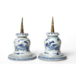 A Pair of Gilt Metal Mounted Chinese Porcelain Altar Candlesticks, probably Kangxi, of inverted bell