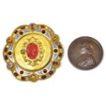 A Gilt Metal Buckle, dated 1854, of lobed circular form, set with a central carnelian cameo,