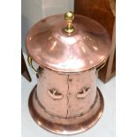 An Arts & Crafts Brass and Copper Coal Bin, the domed lid with brass handle, the bin with riveted