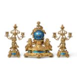 An Ormolu Striking Mantel Clock with Garniture, circa 1880, surmounted by a bust of a lady,