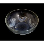 René Lalique (French, 1860-1945): A Clear and Frosted Glass Ondines Bowl, the underside moulded with