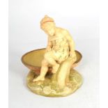 A Royal Worcester figural dish by James Hadley, shape number 1247, with impressed signature and date