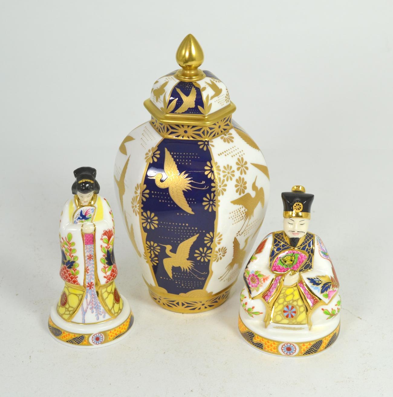 Two modern Royal Worcester figures, emperor and empress together with a modern Royal Worcester