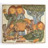 A Michael Andersen relief decorated plaque, depicting apple pickers, 33cm by 28.5cm