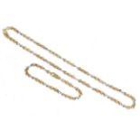 A 9 carat two colour gold fancy link necklace and bracelet suite, of rose gold belcher links