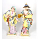 A pair of large Continental painted porcelain figures (a.f.)