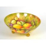 A Coalport fruit painted bowl signed N.Lear