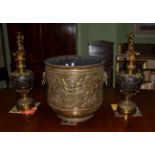 A pair of Continental bronze mounted decorative jugs and a Continental brass planter (3)