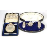 A Barraclough & Sons of Leeds silver oyster dish and fork, a silver six division toast rack and a