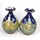 A pair of Royal Doulton vases