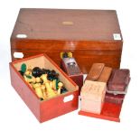 A box of chess pieces, a leather card case, a writing box, opera glasses etc