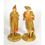 A pair of Royal Worcester figures modelled as Bringaree Indians, puce printed marks to base