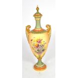 A Royal Worcester blush ivory floral painted twin handled vase and cover, shape number 999, dated