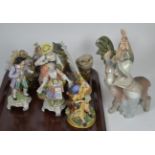 A tray of Continental porcelain figures and models including a Lladro boy and donkey