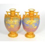 A pair of Royal Worcester blue lustre and gilt vases, shape number 1654, 20cm