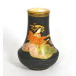 A Satsuma earthenware vase, Meiji period, of swept cylindrical form, painted with geishas on a